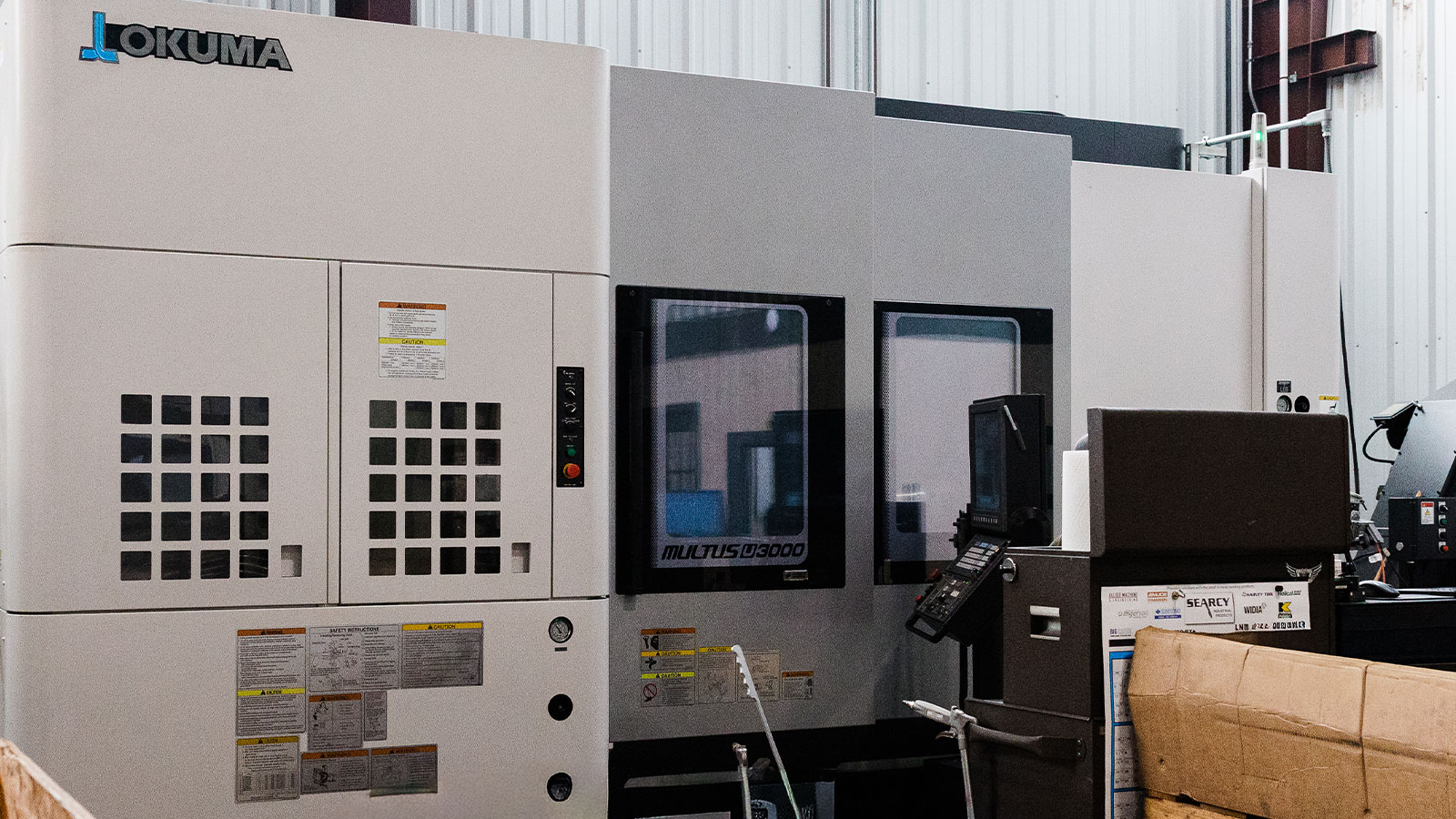 A Okuma MULTUS U3000 9-axis turning center machine.