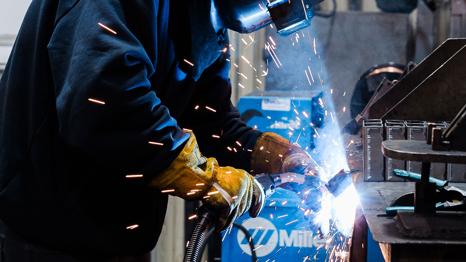 Welder welding some parts at JTD.