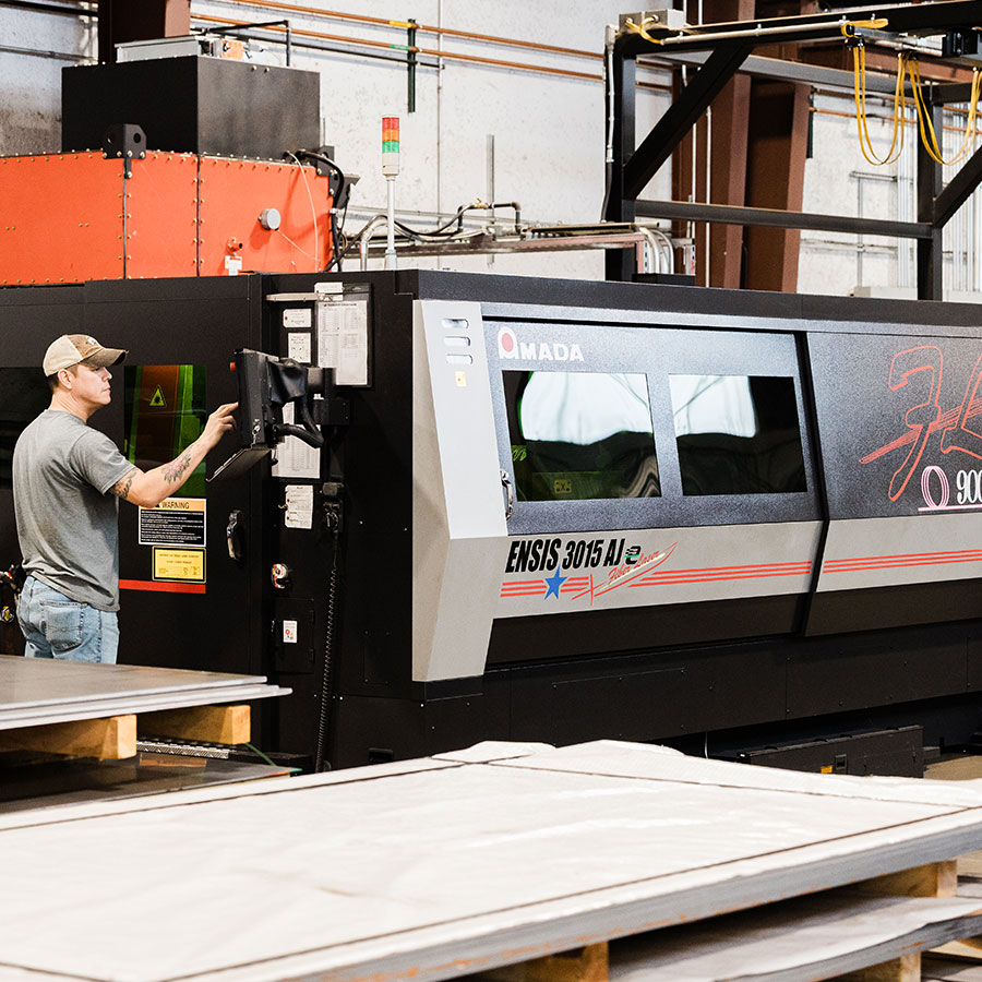 JTD making an adjustment on the AMADA Ensis laser