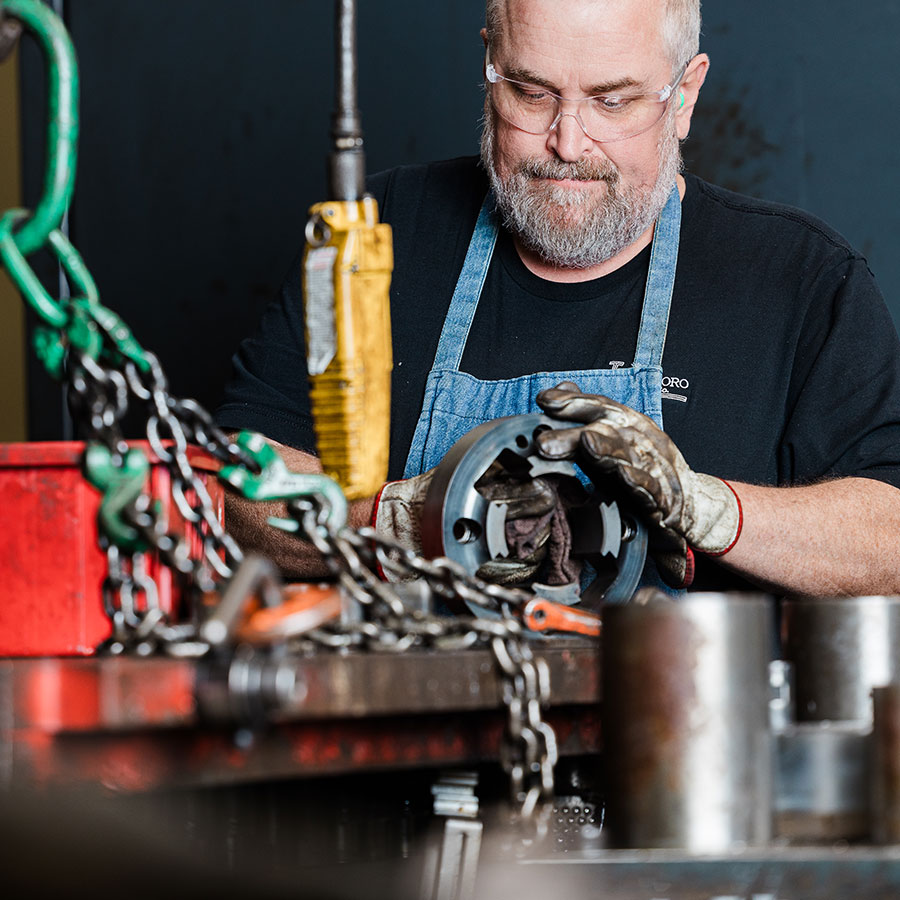 a Jonesboro Tool & Die craftsman working on a die design.
