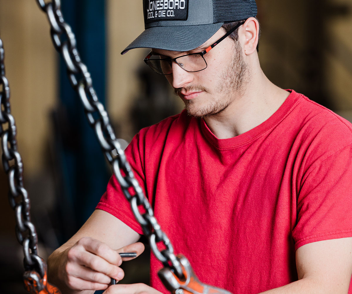Jonesboro Tool & Die employee working on a die design.